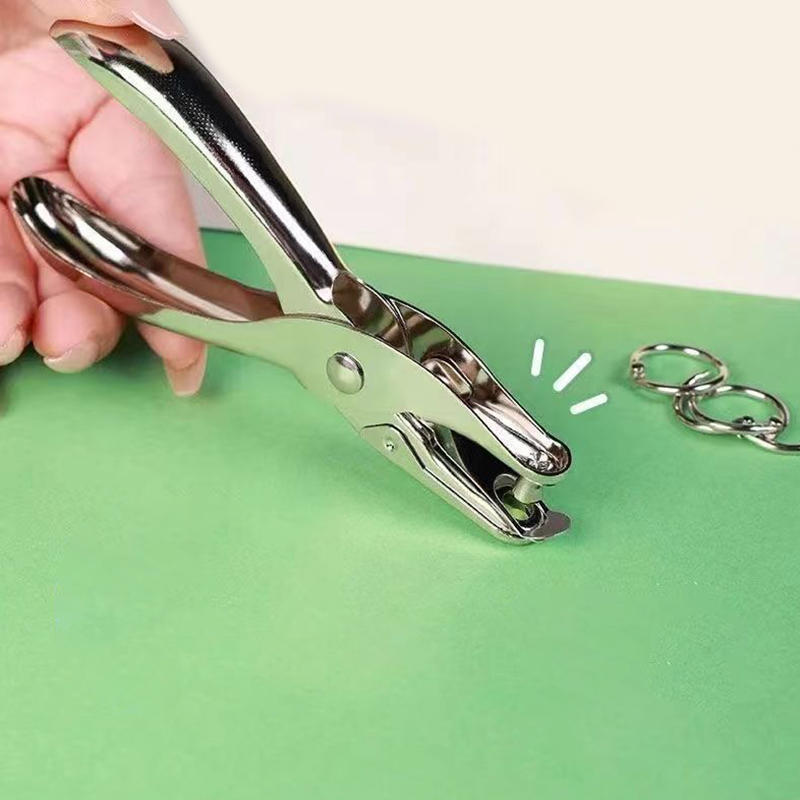Hand Held Metal Stationery Rou - Paper Punch 3 Hole recension och pris